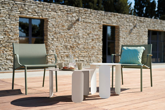 Fermob Bebop outdoor furniture in a garden setting