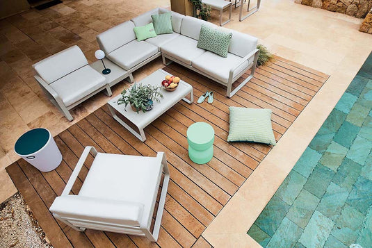 Fermob Bellevie outdoor lounge furniture in a garden setting