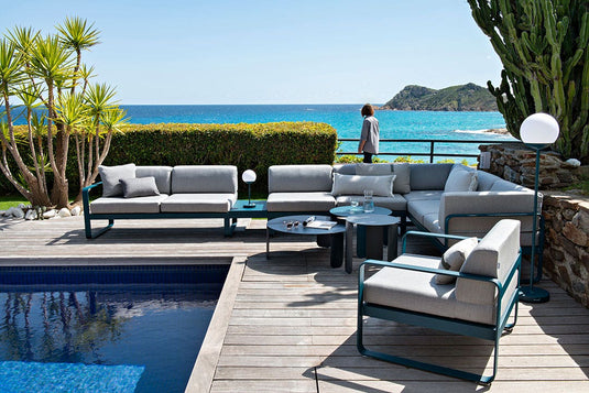 Fermob Bellevie outdoor lounge furniture in a garden setting