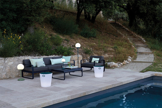 Fermob Bellevie outdoor lounge furniture in a garden setting