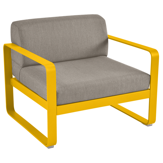 Fermob Bellevie outdoor lounge armchair– Honey frame with Grey Taupe fabric cushions