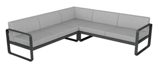 Fermob Bellevie Composition 2 outdoor lounge sofa set with anthracite and grey fabric cushions, modular design for outdoor use.