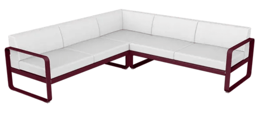 Fermob Bellevie Composition 2 outdoor lounge set with black, cherry, blue, and off-white cushions and modular sofa design.
