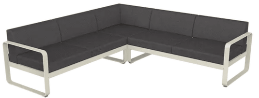 Fermob Bellevie Composition 2 outdoor lounge sofa set with clay, grey, and graphite cushions on a patio.