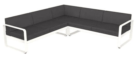 Fermob Bellevie Composition 2 outdoor lounge set with white cotton cushions and graphite grey modular sofa for stylish outdoor seating.