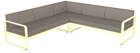 Fermob Bellevie Composition 2 outdoor sofa set with white, grey, and taupe cushions on a modern patio.