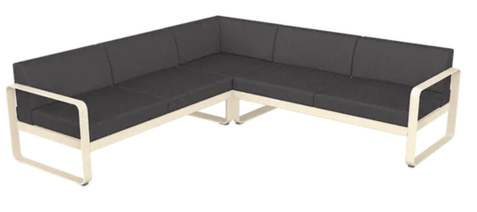Fermob Bellevie modular outdoor lounge sofa set with latte and graphite grey cushions, showcasing a stylish outdoor seating arrangement.