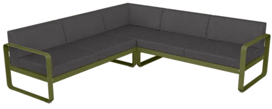 Fermob Bellevie Composition 2 outdoor modular sofa set with grey and pesto-colored cushions, designed for garden relaxation.
