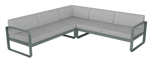 Storm grey Fermob Bellevie Composition 2 outdoor sofa set with plush grey cushions, perfect for stylish outdoor lounging.