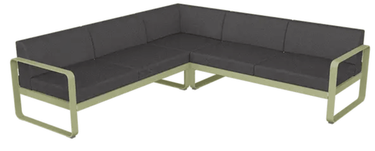 Fermob Bellevie Composition 2 outdoor lounge sofa set with willow green, graphite gray, and beige cushions on a patio.