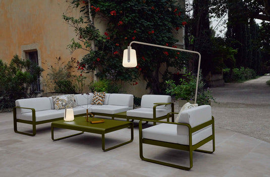 Fermob Bellevie outdoor lounge furniture in a garden setting