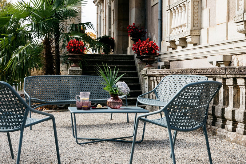 Load image into Gallery viewer, Fermob Croisette low table with armchairs and bench in Storm Grey

