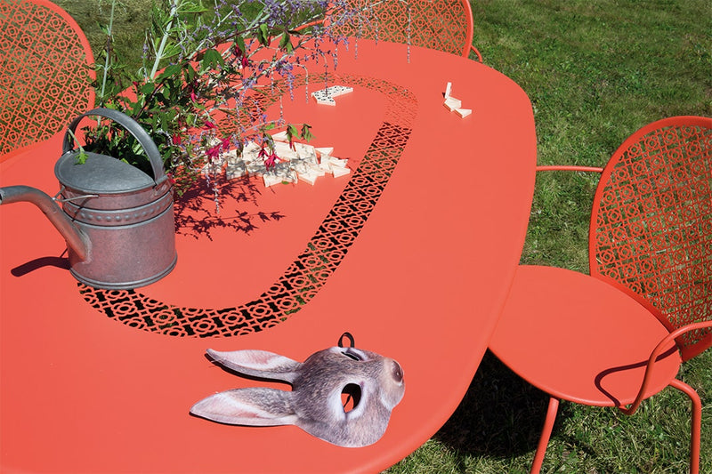 Load image into Gallery viewer, Fermob Lorette armchairs and oval table in the garden
