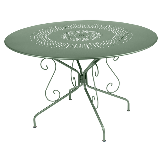 Fermob Montmartre Table Ø117 cm in Cactus – large round perforated steel garden table Ø 117 cm