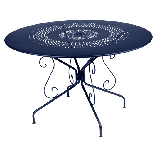 Fermob Montmartre Table Ø117 cm in Deep Blue – large round perforated steel garden table Ø 117 cm