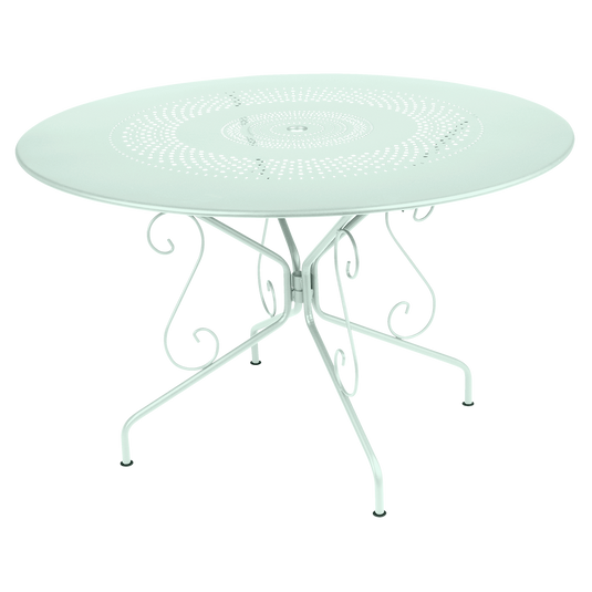 Fermob Montmartre Table Ø117 cm in Ice Mint – large round perforated steel garden table Ø 117 cm