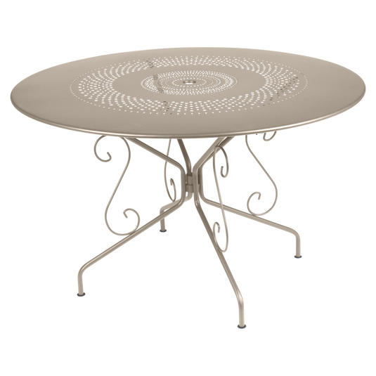 Fermob Montmartre Table Ø117 cm in Nutmeg – large round perforated steel garden table Ø 117 cm
