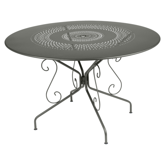 Fermob Montmartre Table Ø117 cm in Rosemary – large round perforated steel garden table Ø 117 cm