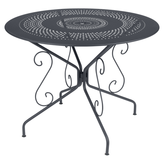 Fermob Montmartre Table Ø96 cm in Anthracite – round perforated steel garden table Ø 96 cm