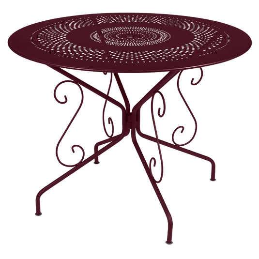 Fermob Montmartre Table Ø96 cm in Black Cherry – round perforated steel garden table Ø 96 cm