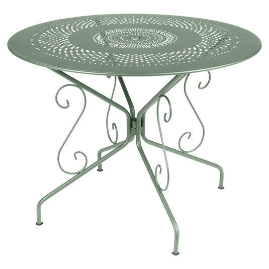 Fermob Montmartre Table Ø96 cm in Cactus – round perforated steel garden table Ø 96 cm