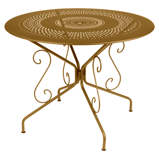 Fermob Montmartre Table Ø96 cm in Gingerbread – round perforated steel garden table Ø 96 cm