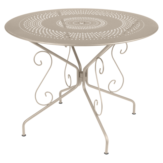 Fermob Montmartre Table Ø96 cm in Nutmeg – round perforated steel garden table Ø 96 cm