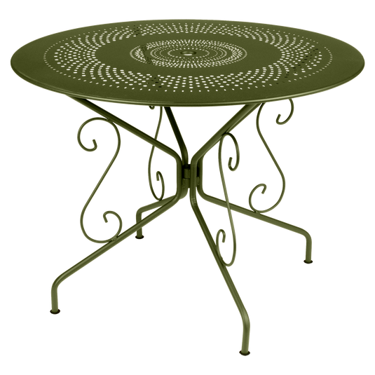 Fermob Montmartre Table Ø96 cm in Pesto Green – round perforated steel garden table Ø 96 cm