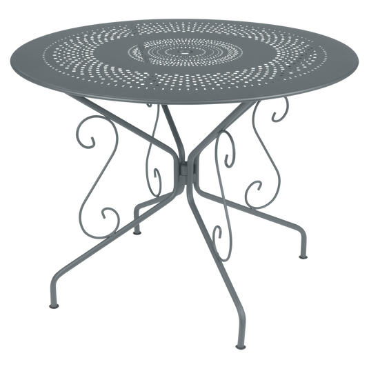 Fermob Montmartre Table Ø96 cm in Storm Grey – round perforated steel garden table Ø 96 cm