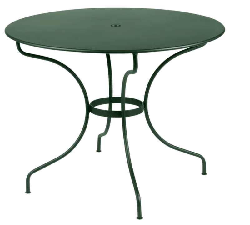 Load image into Gallery viewer, Fermob OPÉRA+ outdoor metal table in cedar green, 96 cm diameter, perfect for five-seater patio dining.
