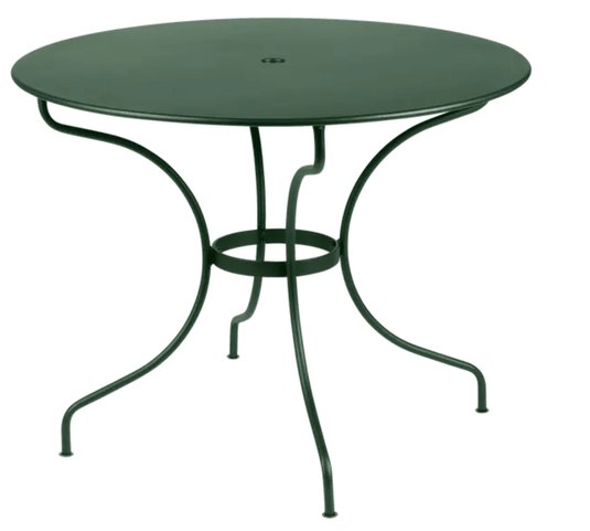 Fermob OPÉRA+ outdoor metal table in cedar green, 96 cm diameter, perfect for five-seater patio dining.