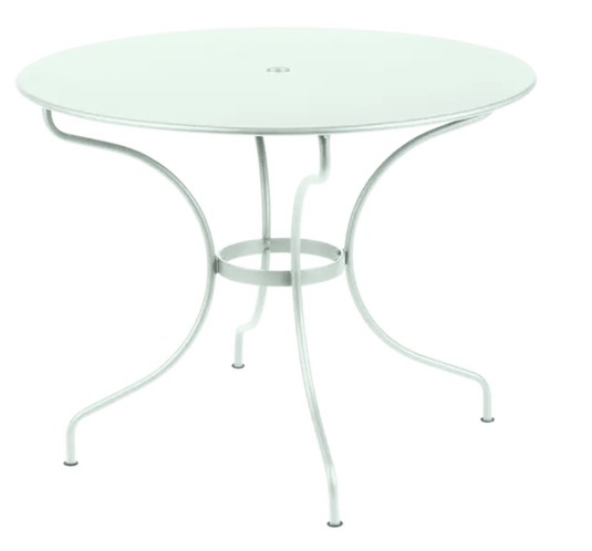 Fermob OPÉRA+ outdoor metal table in Ice Mint, 96 cm diameter, ideal for five-seater patio dining.