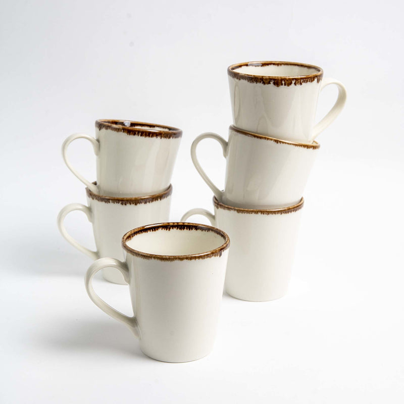 Load image into Gallery viewer, Fine Dine vanilla cappuccino cup, 285ml, featuring a white ceramic design with a smooth handle and filled with frothy cappuccino.
