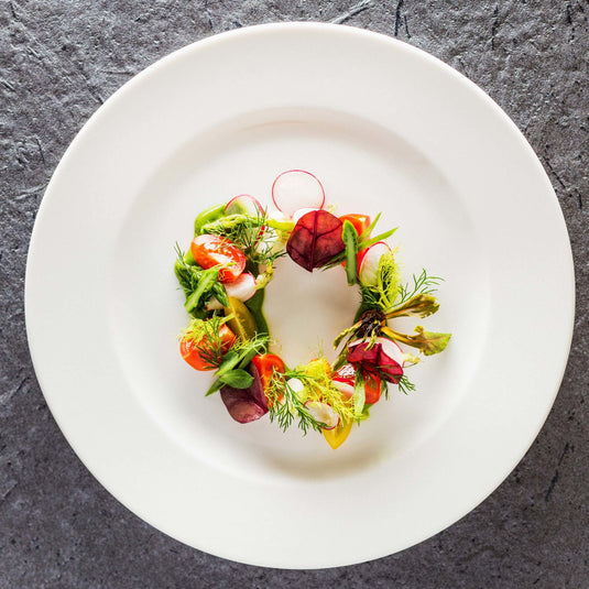 Fine Dine Crema flat plate, 270mm shallow ceramic dish with a smooth, rounded edge set against a neutral background.