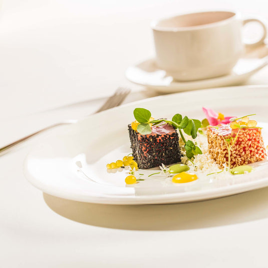 Fine Dine Crema flat plate, 240mm shallow ceramic dinner plate with smooth, rounded edges and a glossy finish.