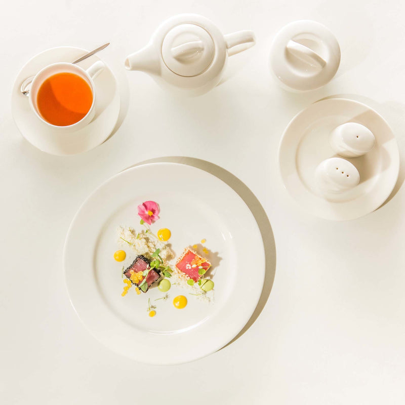 Load image into Gallery viewer, Fine Dine Crema flat shallow plate, 240mm diameter, ceramic dinnerware with smooth, elegant design and clean white finish.

