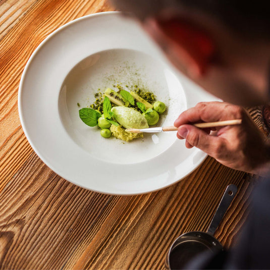 Fine Dine Crema pasta plate, 260mm, showcasing a stylish, round ceramic plate with a smooth cream-colored finish for serving pasta.