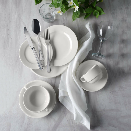Oval ceramic platter by Fine Dine, 290x200mm, perfect for serving appetizers or main dishes.