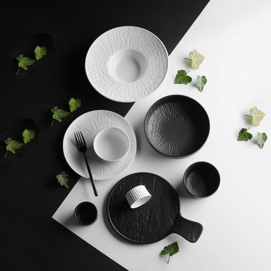 Rectangular plate by Fine Dine, 335x205mm, with a smooth surface, ideal for serving appetizers or main dishes.