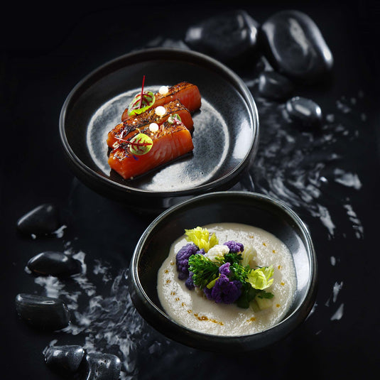 Fine Dine Onyx gourmet plate, 200mm, featuring a sleek black ceramic design on a white background.