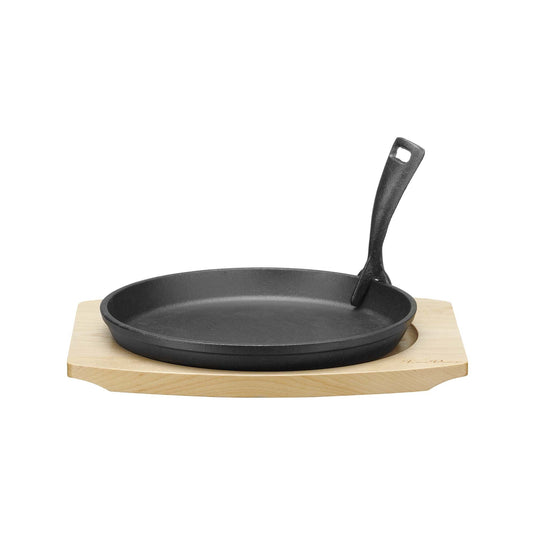 Cast iron serving pan with wooden base and handle, 220mm diameter, from Fine Dine, featuring a sturdy cast iron construction and wooden accents.