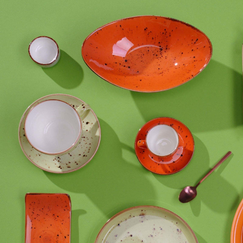 Load image into Gallery viewer, Fine Dine olive cappuccino cup, 285ml, ceramic with green olive design, shown filled with cappuccino on a wooden surface.
