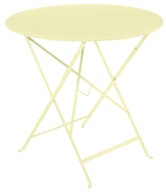 Fermob Bistro Round Folding Table Ø77cm with frosted lemon finish, ideal for outdoor dining and hospitality settings.