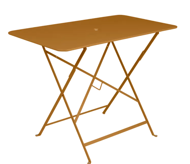 Load image into Gallery viewer, Fermob metal foldable bistro table in gingerbread orange, 97 x 57 cm, ideal for restaurant terraces and outdoor dining.

