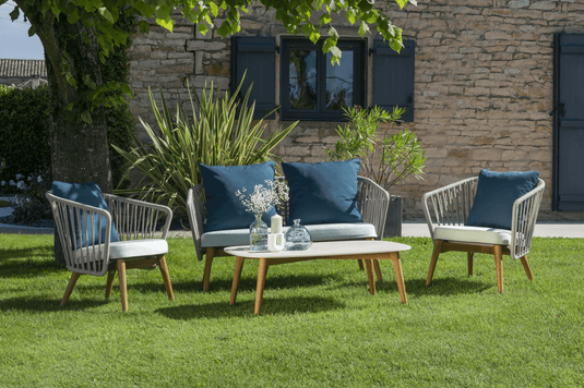 Fermob GORDES 2-Seater Teak Outdoor Sofa with sleek teak wood frame and comfortable cushions, ideal for outdoor patio seating.