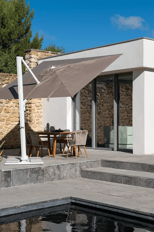 Fermob GORDES luxury teak outdoor chair with cushioned seating, ideal for garden or patio outdoor spaces.
