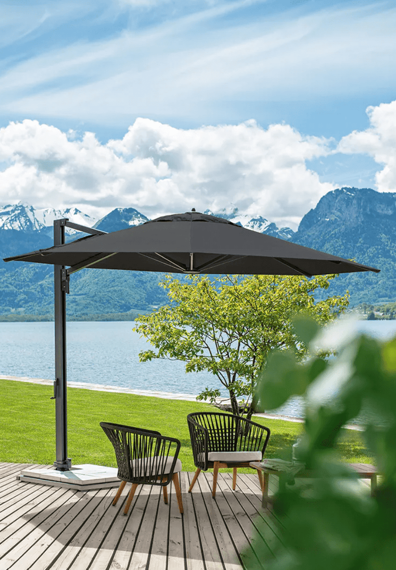 Load image into Gallery viewer, Fermob GORDES outdoor teak armchair with low arms and woven rope design, ideal for patio or garden seating.
