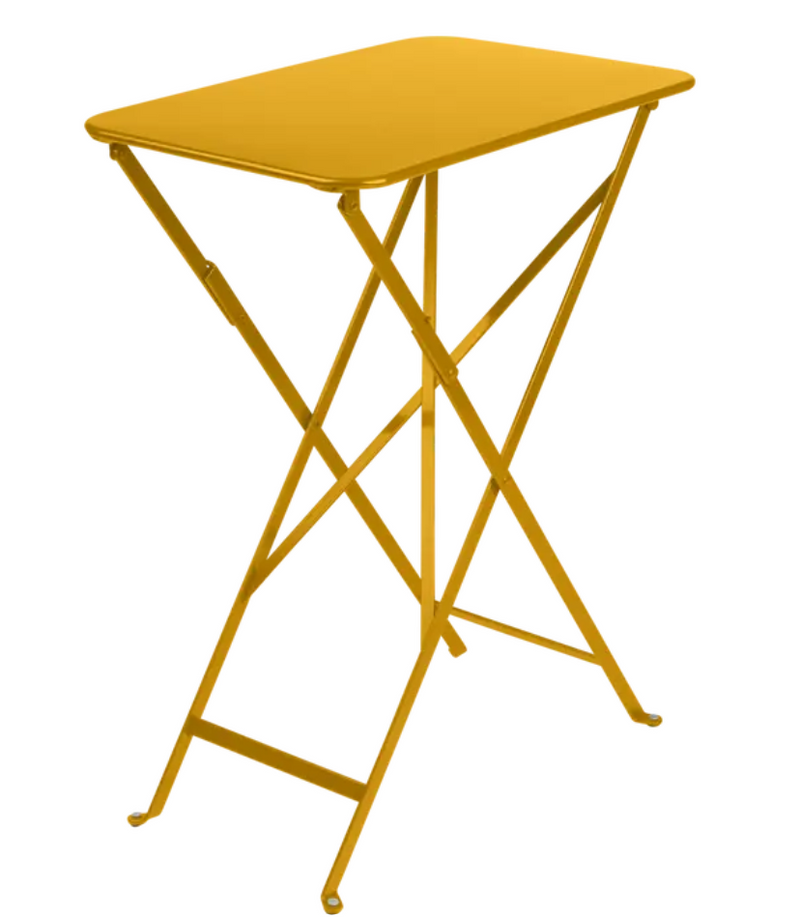 Load image into Gallery viewer, Fermob Bistro folding table in honey deep orange, rectangular metal outdoor cafe table, UV resistant, ideal for small spaces.
