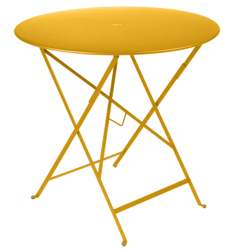 Load image into Gallery viewer, Vibrant honey orange Fermob Bistro round foldable steel table Ø77cm, suitable for outdoor dining and hospitality use.
