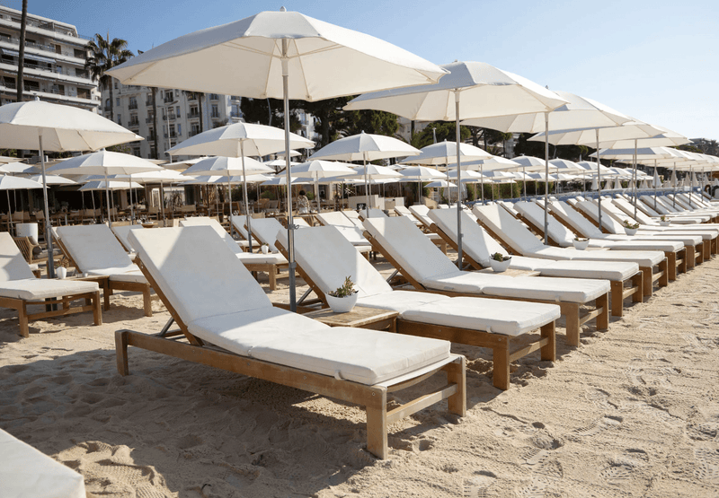 Load image into Gallery viewer, Fermob IBIZA teak outdoor sunlounger with cushioned seat and backrest, ideal for poolside lounging and outdoor relaxation.
